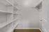 Closet with built in shelving.