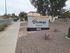 A photo showcasing the property sign at Blacklidge Flats.