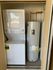 Compact washer and dryer concealed within a closet at Hedrick Flats.