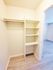 Empty closet with shelves in a room