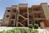 The Edison Apartments: A multi-story apartment complex with stairs and balconies.
