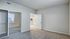 Carpeted bedroom with closet