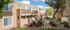 La Loma Terrace Apartments: An inviting apartment complex with outdoor stairs and a beautiful landscaped lawn