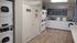 Laundry room at Sierra Oaks with multiple washers and dryers