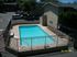 Sierra Oaks gated pool with chairs