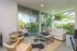 Living room with floor to ceiling windows