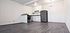 white cabinet kitchen with stainless steel appliances