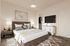 Modern bedroom staging with queen bed