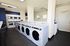 Laundry Room with plenty of machines