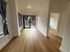 Living room with large windows and patio door