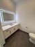 Bathroom sink with large mirror