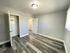 Large bedroom with hard wood floors