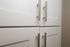 White cabinetry with new hardware