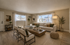 Spacious living room with an abundance of natural light!