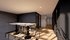 Sleek modern apartment with chic brick walls and a cozy breakfast bar, illuminated by soft recessed lighting.