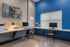 Inviting workspace with modern desks, comfortable chairs, and natural lighting, perfect for productivity.