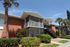Photo of 2 story building with screened porches.
