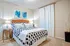 Bedroom with wall closet.
