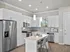 Sleek modern kitchen with stainless steel appliances and white cabinetry