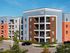 Vibrant modern apartment complex with multi-colored facade and spacious balconies.