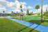 shuffleboard and putting green by the lake