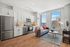 Bright and modern apartment with a sleek kitchen, featuring stainless steel appliances and a cozy living area with large windows overlooking city views.