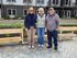 Residents enjoying the beautiful landscaped garden area, showcasing a community focus in a modern apartment building.