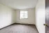 Interior photo of main bedroom with large window at Mountain View apartment in Oregon City, OR. 1 bed, 1 bath unit