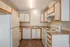 Kitchen with plenty of storage and modern appliances inside the 1 bedroom, 1 bath unit at Meadow Crest in Vancouver, WA