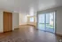Interior photo of living and dining area with renovated floors and spacious closet at Meadow Crest apartments in Vancouver