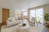Virtually staged living and dining room area for the Meadow Crest apartments in Vancouver, WA
