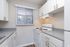 Additional interior photo of modern, updated kitchen at The Maples