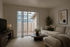 Cozy and inviting living room with a plush beige sectional sofa, large sliding glass doors opening to a balcony, and elegant decor on a wooden coffee table.