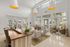 Bright and welcoming lobby with elegant seating, large windows, and modern decor.
