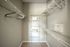 bedroom closet with railing