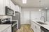 Stainless Steel Appliances and Quartz Countertops