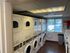 Laundry room with multiple washers and dryers