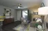 furnished living area with view of entry door