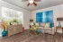 furnished living area with large window