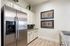 Clubhouse Kitchen at Eaglebrook Apartments in Mont Belvieu, Texas,TX
