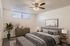 bedroom with large bed and small window