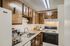 Kitchen with brown cabinets