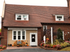 Exterior view of leasing office at Colonial Village apartments in Manchester, NH