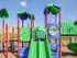 Front view of a vibrant kids' play structure with twin green slides and interactive play panels at Embassy Ozark.