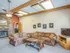 Comfortable resident lounge at Willow Creek Apartments featuring soft couches, rustic d&eacute;cor, and a welcoming atmosphere for residents.