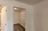 Walk-in closet with shelving &ndash; Large walk-in closet at Republic Palms Apartments in Republic, MO, featuring carpet flooring and built-in white wire shelves for organized storage.