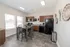 Bright and inviting kitchen with modern appliances, stylish cabinetry, and a charming dining area perfect for family gatherings.