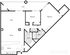 Floor plan of a two-bedroom apartment with angled layout. Includes living, dining areas, kitchen, two bathrooms, and a patio. Clean lines, functional design.