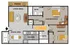 Floor plan of a two-bedroom, two-bathroom apartment. The layout includes a patio connected to the living area, which features a couch, coffee table, and TV. Adjacent to the living area is the dining area with a table and two chairs, and a kitchen with a sink, stove, and refrigerator. The left side includes a washer and dryer closet. The main bedroom includes a bed, two nightstands, a desk with a chair, and an en-suite bathroom with a tub, toilet, and sink. A second bedroom includes a bed and dresser. A second bathroom near the kitchen includes a bathtub, toilet, and sink. The HVAC unit and closet are located in the hallway between the main areas and the bedrooms.