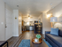 Open-Concept Living Area with plank-style flooring  | Apartment Homes in Lawrence, KS | The Rockland